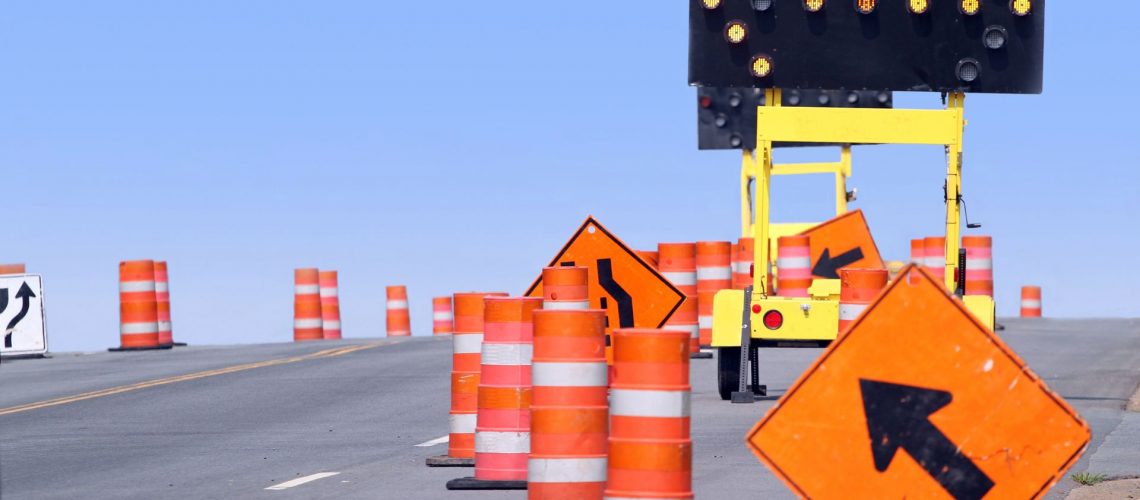 traffic control road work signs on the road