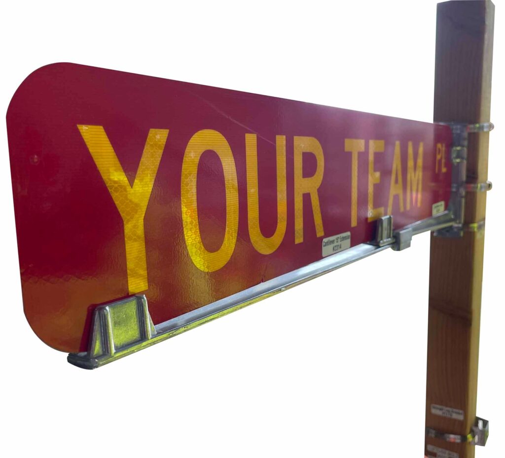 red road sign that reads "your team" on it