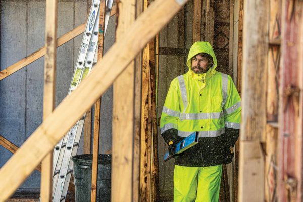 Man Wearing Protective Rainwear