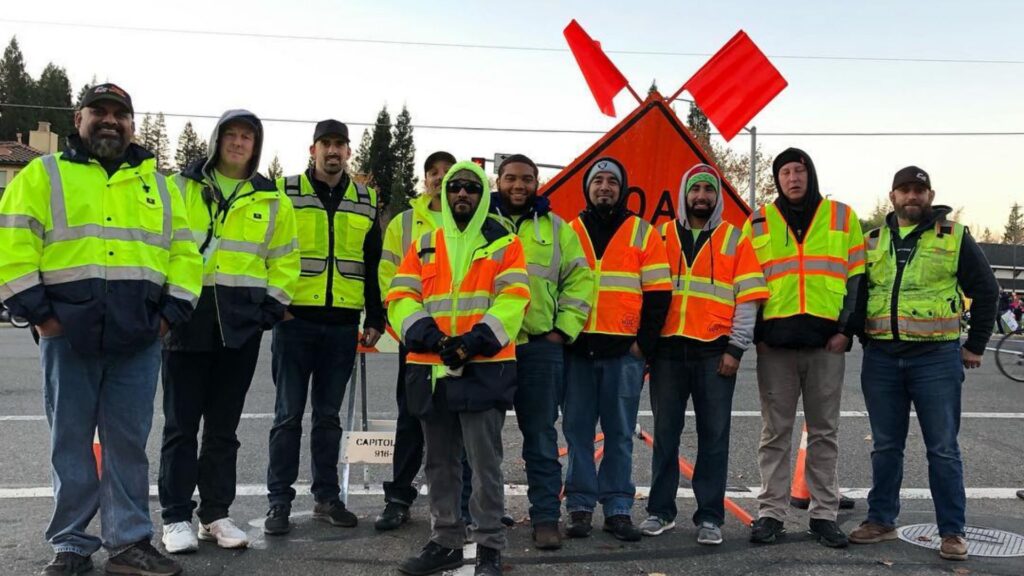 men in ppe gear from capitol barricade